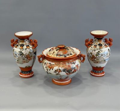 three vases that are sitting next to each other on a table