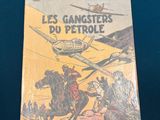 la bande dessinée française *Les gangsters du pétrole*, avec l'image d'un homme à cheval