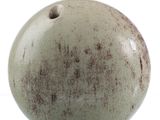 an image of a green apple with brown spots on it