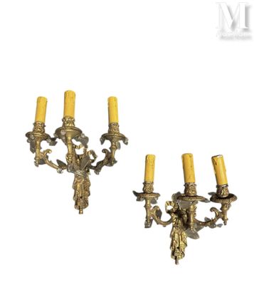 pair of antique brass wall sconces with angels and candles