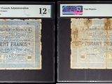 deux anciens billets de banque à fond noir