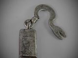 a metal keychain with a metal hook attached to it