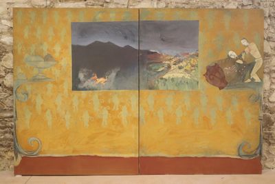 a painting on the wall of a building with a painting of a man and a woman