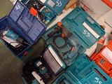 many tools that are sitting on the floor in the room