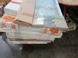 a pile of boxes and boxes on a table