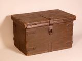 an old wooden chest with a lock on it
