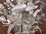 a picture of a decorative piece on a wooden table