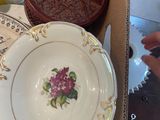 a box with plates and bowls in it on a table
