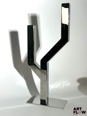 a black and white photo of a candle holder