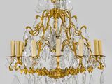 an image of a chandelier made of glass and brass
