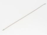 a close up of a long silver chain on a white surface