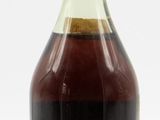 a bottle of alcohol that is sitting on a table