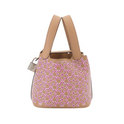 a close up of a purse on a white background