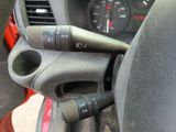 a close up of a steering control in a car