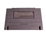 a gray nintendo game console with a white background