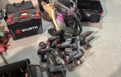 a pile of tools that are sitting on the floor