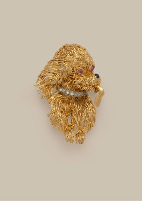 an image of a gold and diamond dog broochle