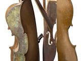 a close up of a sculpture of a violin and a violin case