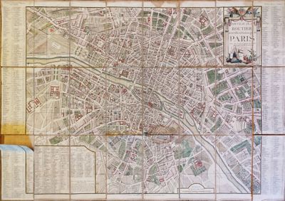 une vieille carte d'une ville sur un mur carrelé dans une pièce