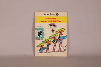 an image of a picture of a comic book on a table