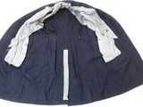 blue and white jacket with zippers on both sides of the jacket