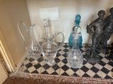 a lot of glass items sitting on a table