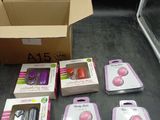 boxes of electronic gadgets are sitting on a table next to a box