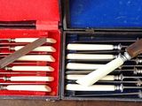 a box of knives and a knife sharper in it