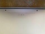 a laptop that is sitting on a wooden table