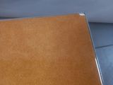 a brown piece of paper on the table