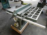 an image of a table saw is sitting on a table in a workshop