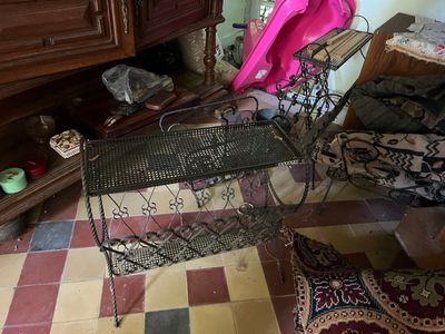 a table and chair in the corner of a room