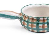 a green and white cup with a handle on a white background