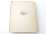 an old book with a drawing of a cat on it