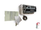 a picture of a camera and some papers on a white surface