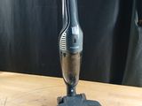 an image of a vacuum cleaner sitting on top of a wooden table