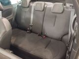 a car that has two seats in the back of it