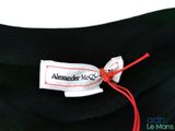 black t - shirt with a red string around the neck and a name tag on it