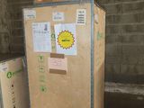 several cardboard boxes are stacked on top of each other in a warehouse