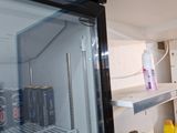 a refrigerator that has a lot of drinks inside of it