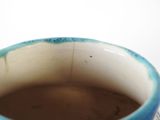 a close up of a cup of coffee on a table