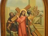 painting of jesus carrying the cross with other people