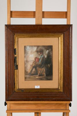 an image of a painting on a easel with a picture of a man
