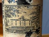 a close up of a bottle of wine on a table