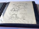 un livre sur lequel figure le dessin d'un homme tenant un parapluie