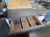 a picture of a work area with a lot of wood