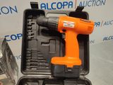 an orange cordless drill in a black case