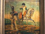 un vieux tableau représentant un homme à cheval dans un champ