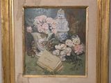 une photo représentant un tableau représentant des fleurs et un livre