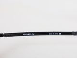 a close up of a pair of glasses on a white surface